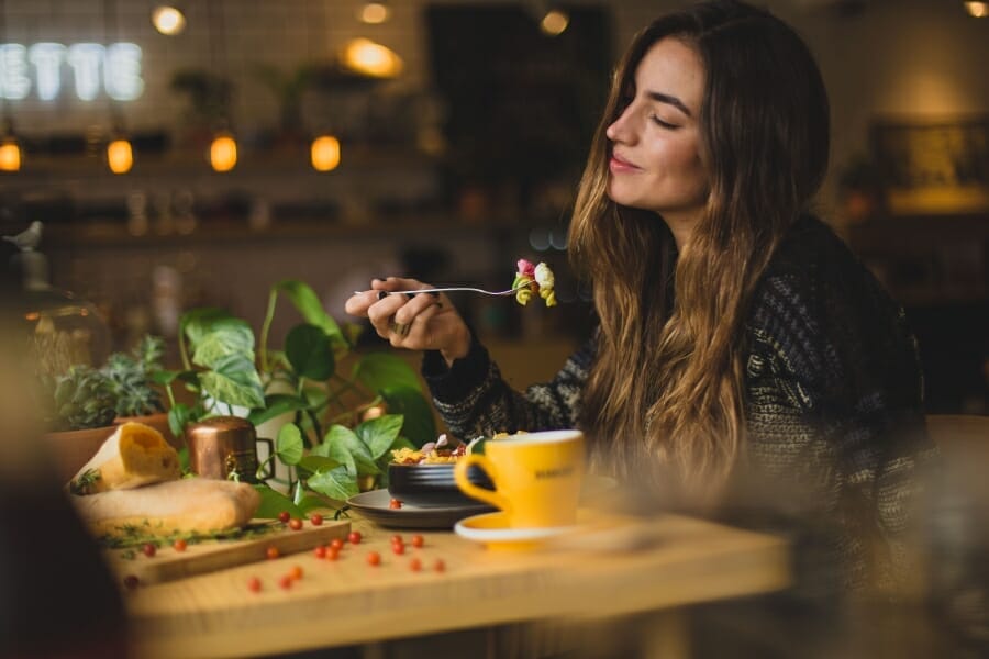 woman enjoying her meal