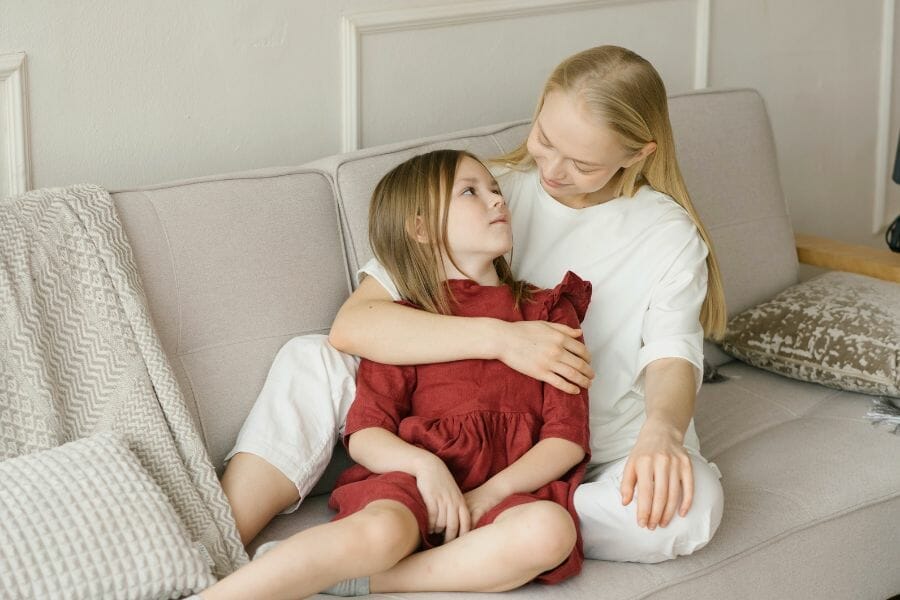 mother providing a safe space for daughter by listening to her thoughts and feelings